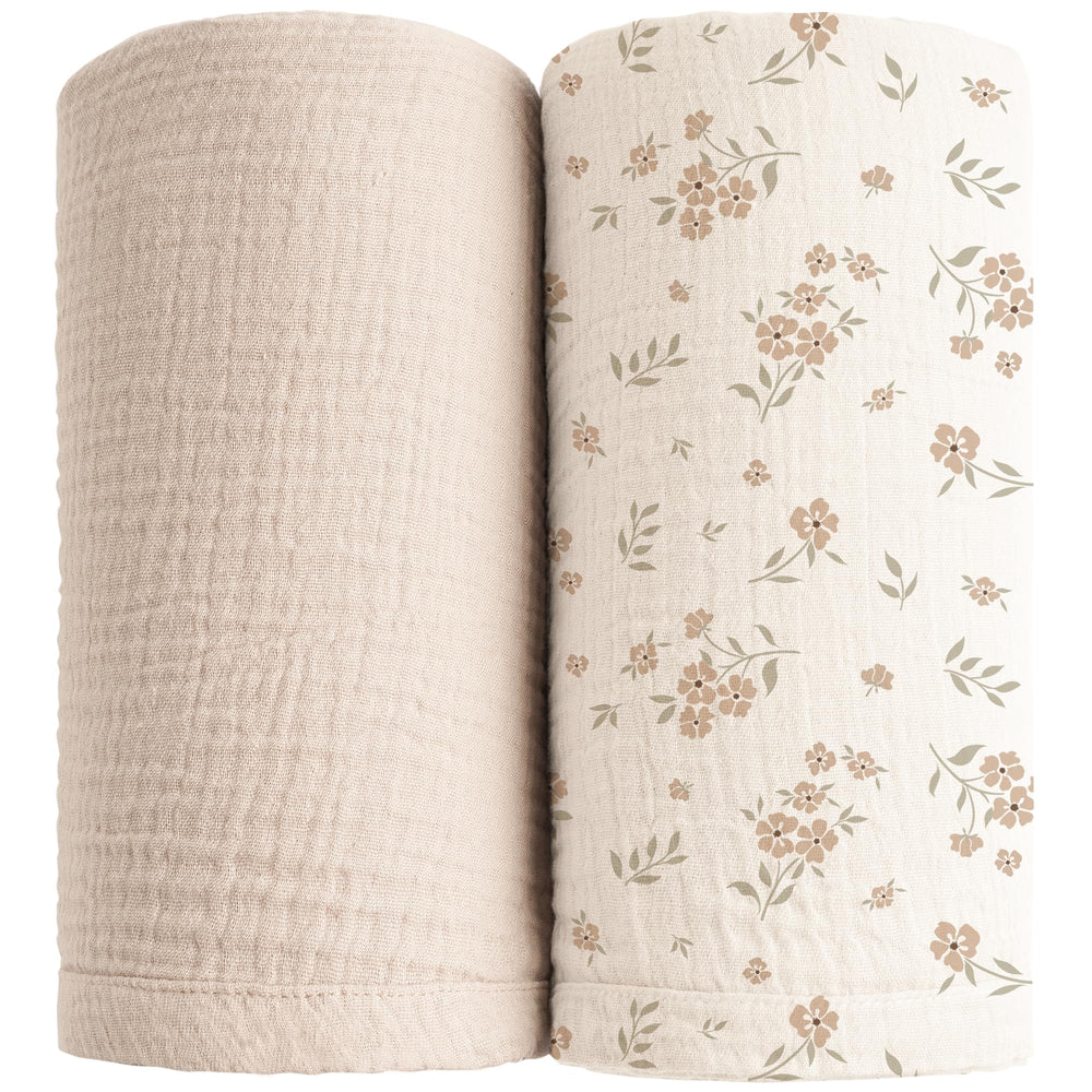 Konssy muslin swaddle blanket in soft cream for newborns, breathable and gentle.