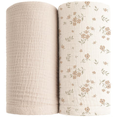 Konssy muslin swaddle blanket in soft cream for newborns, breathable and gentle.