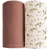 Konssy muslin swaddle soft closeup: breathable fabric gently soothes delicate skin.