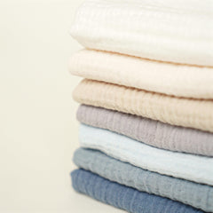 Konssy muslin washcloths 7-pack color variety for easy organization.