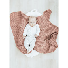 Konssy waffle baby blanket 41x37 inches, roomy swaddle for growing baby.