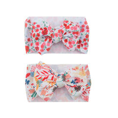 Koolgil baby bowknot headband with flower print for adorable photos.