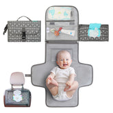Kopi Baby portable changing pad folded for easy storage and quick setup.