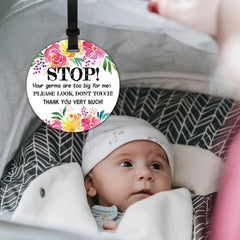 KORTTITALO stroller tag clip-mount shown for quick, secure attachment.