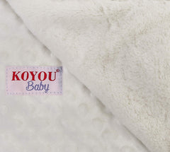 KOYOU Baby blanket satin trim side close-up showing silky edge.