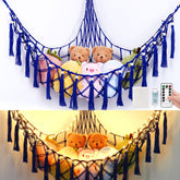 Krislait stuffed animal hammock 55in neatly stores plush toys in a cozy corner.