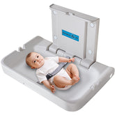 KSITEX wall-mounted baby changing station with silent-close action for quiet diaper changes