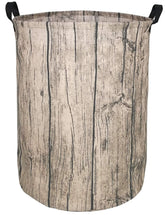 KUNRO round laundry basket with tree-stump top view, ideal nursery storage
