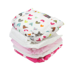 Kushies diaper flap detail showing adjustable absorbency for gender-specific fit.