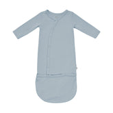 KYTE BABY Bundlers sleeper gown in fog bamboo fabric for gentle sleep and skin comfort.