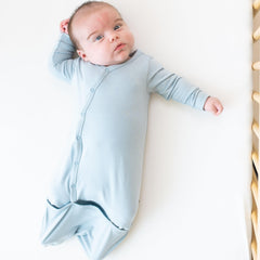 Close-up of snap closures on KYTE BABY Bundlers for easy diaper changes.