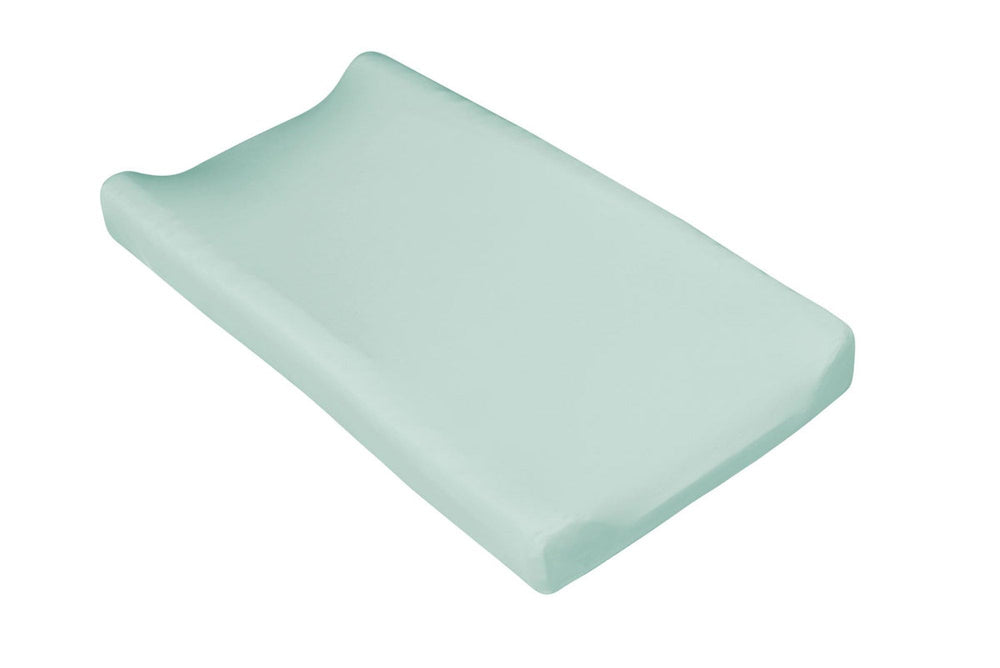 Kyte Baby change pad cover in sage provides silky bamboo rayon comfort for diaper changes.