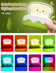 L LOHAS LED toaster-face night light adds cheerful glow to kids' desks.