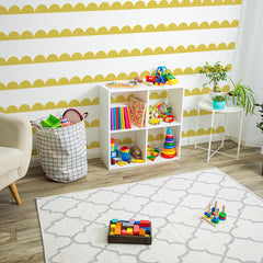 Ladinimo scallop border on living room wall creates a colorful accent line.