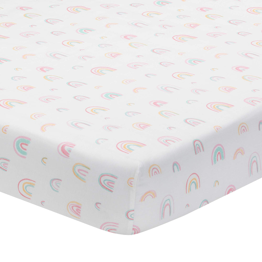 Lambs and Ivy watercolor rainbow crib sheet with soft pastels for a cozy nursery.