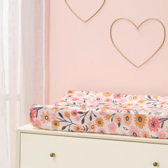 Lambs & Ivy Little Garden with elastic sides ensures secure fit during changes