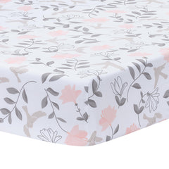 Lambs & Ivy Petals crib sheet pattern with soft floral design for nursery charm.