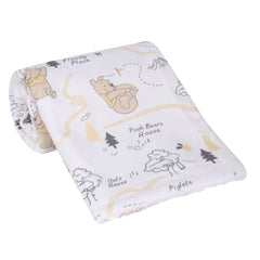 Lambs & Ivy Pooh blanket with Hundred Acre Woods illustration in earth tones for naptime calm.
