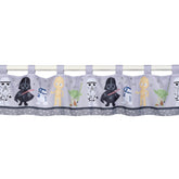 Lambs & Ivy Star Wars valance with Yoda adds playful space theme to kids room decor.