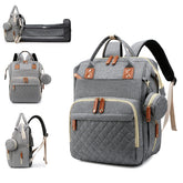 Lamroro diaper bag with changing station shows a foldable pad for convenient diaper changes on the go.