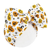 Lanmerry ghost-pattern bow on soft nylon headband, gentle on skin for newborns
