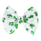 Lanmerry St. Patrick's Day clover sequin bow clip adds festive shine to hairstyles.