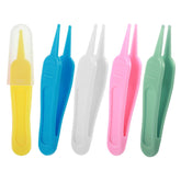 Larrel nose picker with round head in white for gentle nose cleaning.