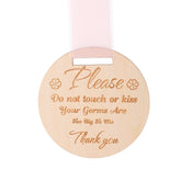Lasuroa round wooden baby sign with ribbon on stroller for reminders