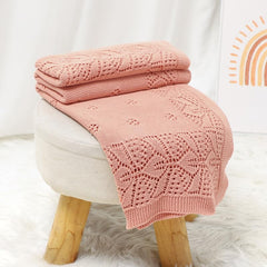 LAWKUL nursery setup with pink blanket enhancing cozy decor