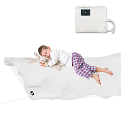 LAXVAPIU grounding sheet in crib showing soft, breathable surface with silver fibers.
