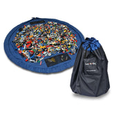 Lay-n-Go 4-in-1 blue toy mat in closed bag for quick cleanup