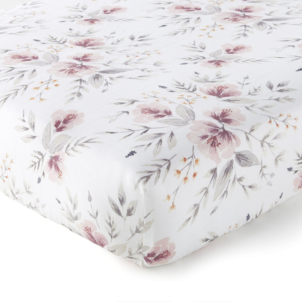 Levtex Baby Adeline crib fitted sheet in pink floral pattern for a coordinated, soft-nursery look.