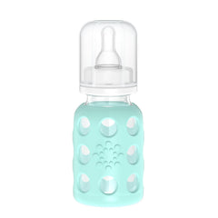 Lifefactory glass baby bottle with mint sleeve for secure grip.