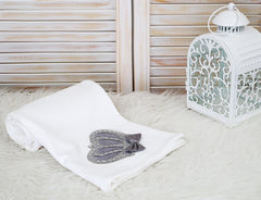 Lilax grey crown jewels swaddle blanket closeup highlights 100% cotton material for sensitive skin comfort