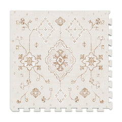 Lillefolk baby play mat halfinch-thick foam tiles provide cushioned tummy time.