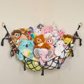 Lilly's Love macrame hammock with lights organizes plushies in a cozy corner.