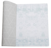 LITTLE Bot Ofie mat with reversible sides for versatile play and decor.