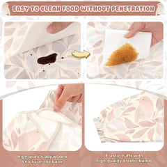 Elastic cuffs on the Little Dimsum bib snugly fit to prevent leaks.