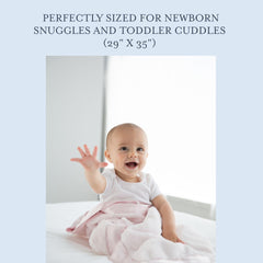 Little Giraffe blanket easy care, machine wash cold and gentle.