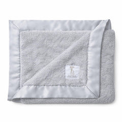 Little Giraffe Luxe Soft Blanket with satin trim for gentle newborn warmth.