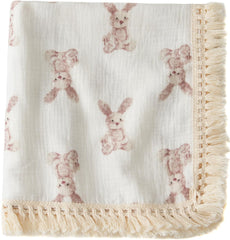 Little Jump cotton muslin swaddle blanket tassel detail for soft, breathable cuddles.