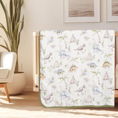Little Jump Dinosaur Muslin Blanket large 47x47 inches shown as roomy toddler bed cover.