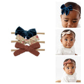 Little Poppy Co Amelia Set mini on nylon headband: soft, secure fit for newborns.