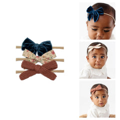 Little Poppy Co Amelia Set mini on nylon headband: soft, secure fit for newborns.