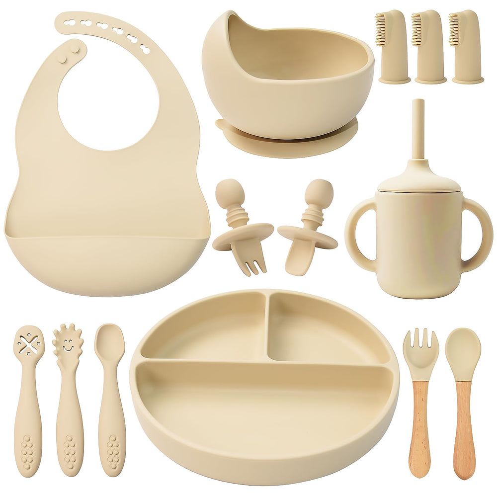Little Rawr suction-divided plate keeps meals organized for self-feeding on a tray.