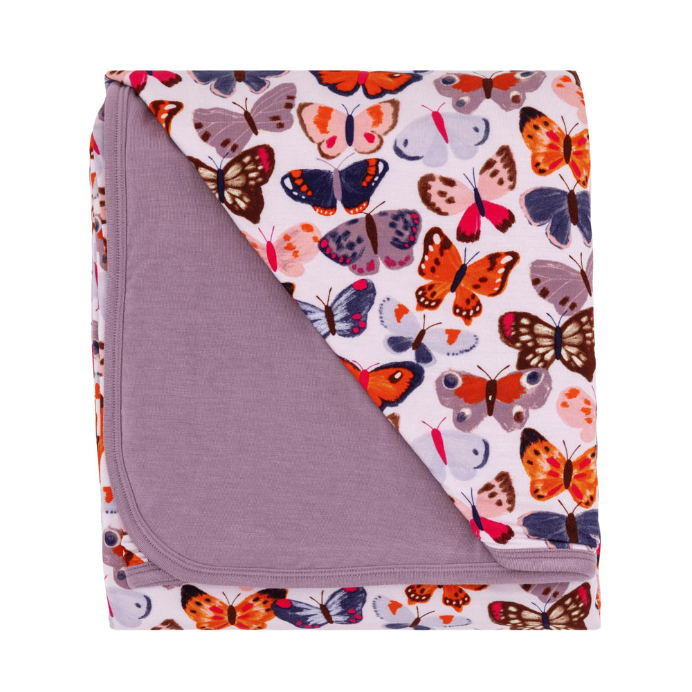 Little Sleepies Cloud Blanket Butterfly Kisses draped for cozy cuddles.