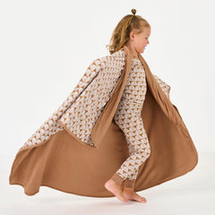 Little Sleepies Cloud Blanket Rust Rainbows nursery styling with coordinating sheets