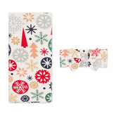 Little Sleepies Lunaluxe swaddle blanket in 44x44 lies flat for cozy newborn snuggles.