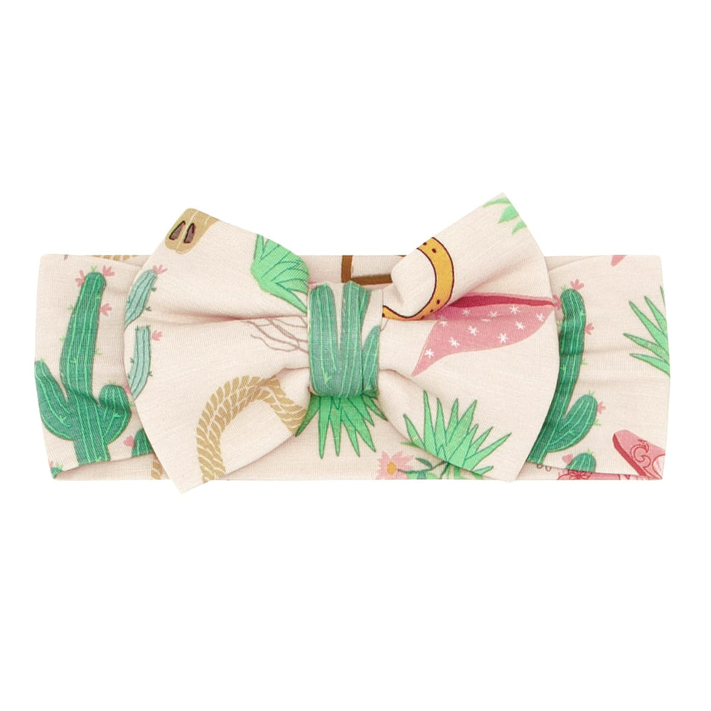 Little Sleepies Luxe Bow Headband Ready to Rodeo with loops for easy wear and lasting softness.