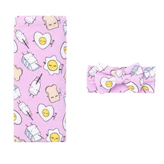 Little Sleepies swaddle set with bow in Pink Breakfast Buddies for cozy newborn comfort